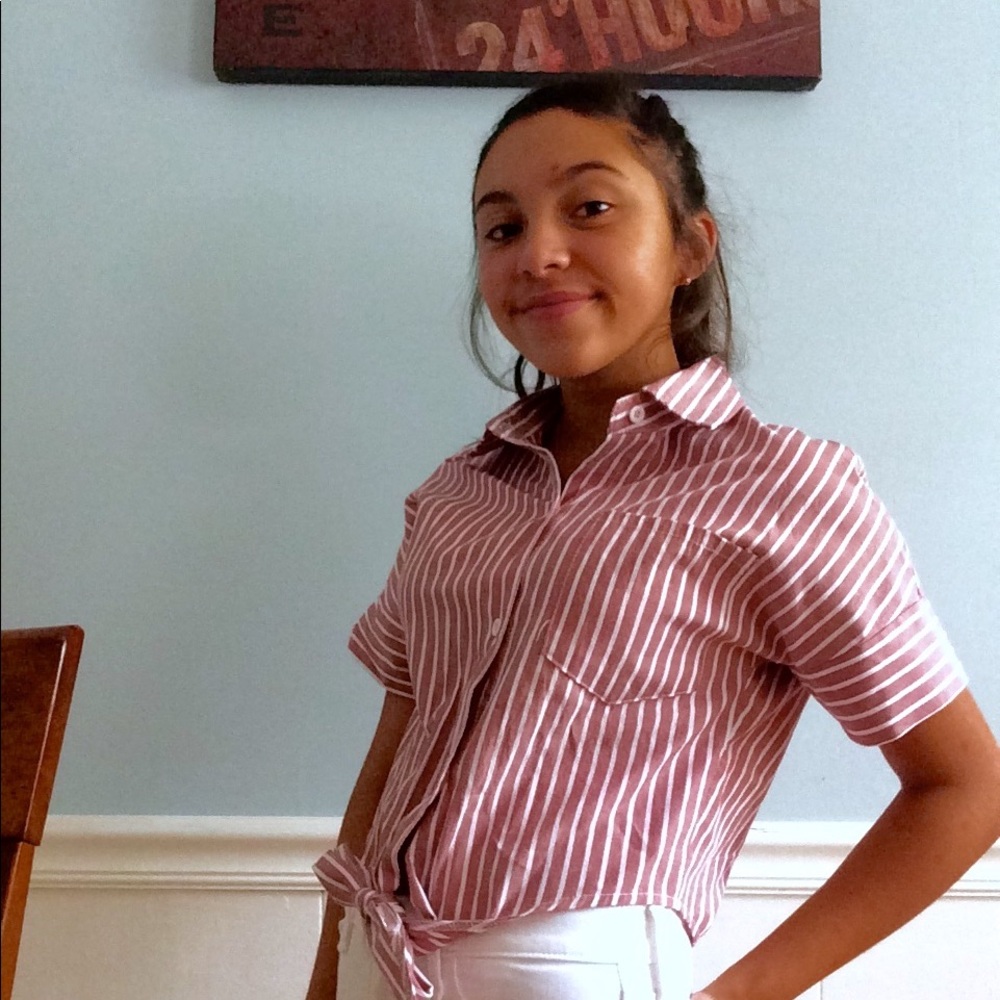white and pink striped polo